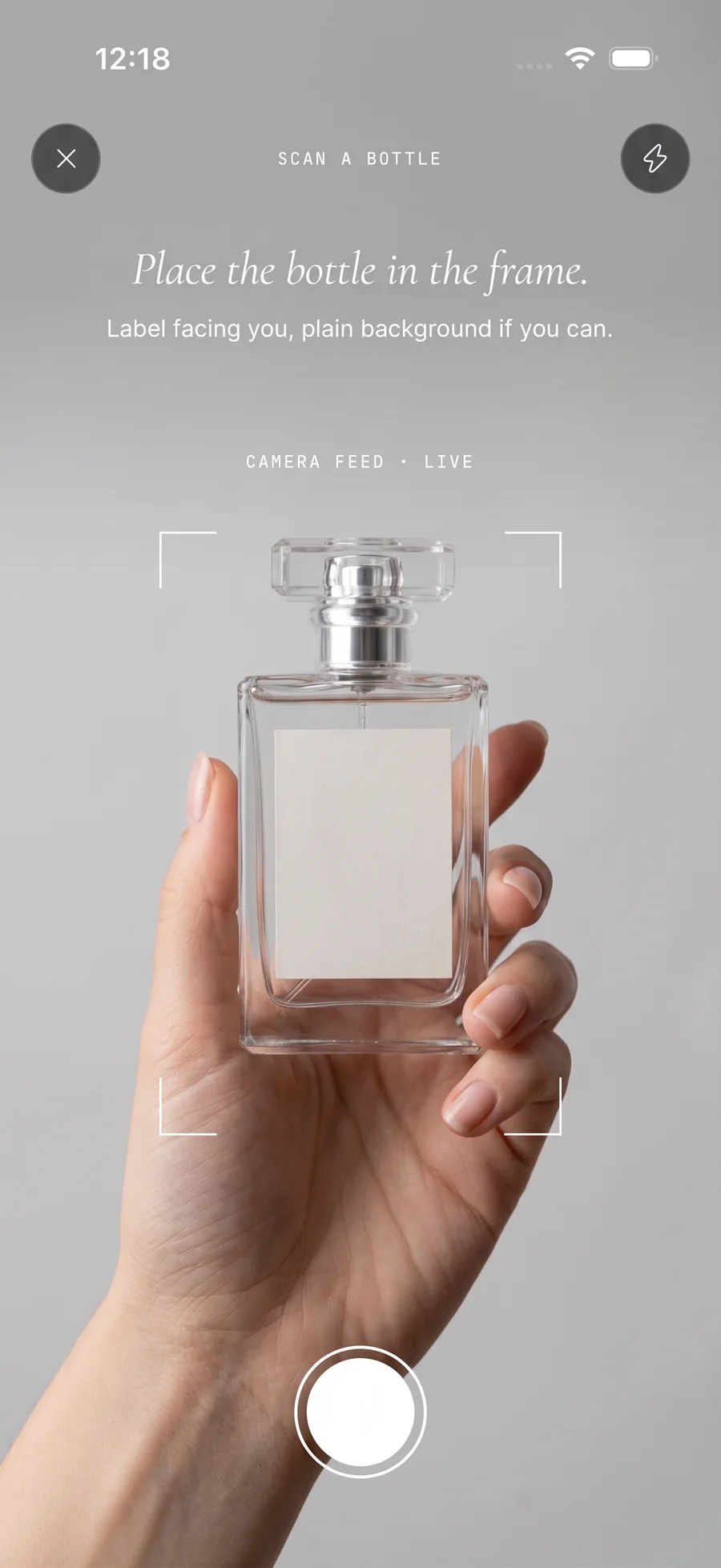 The ScentPass scanner, with a bottle framed inside the camera guides